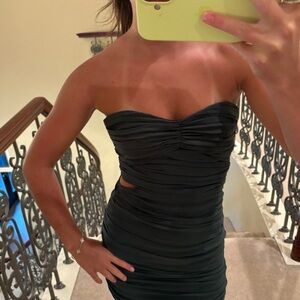 Dark green strapless mini dress with side cutout